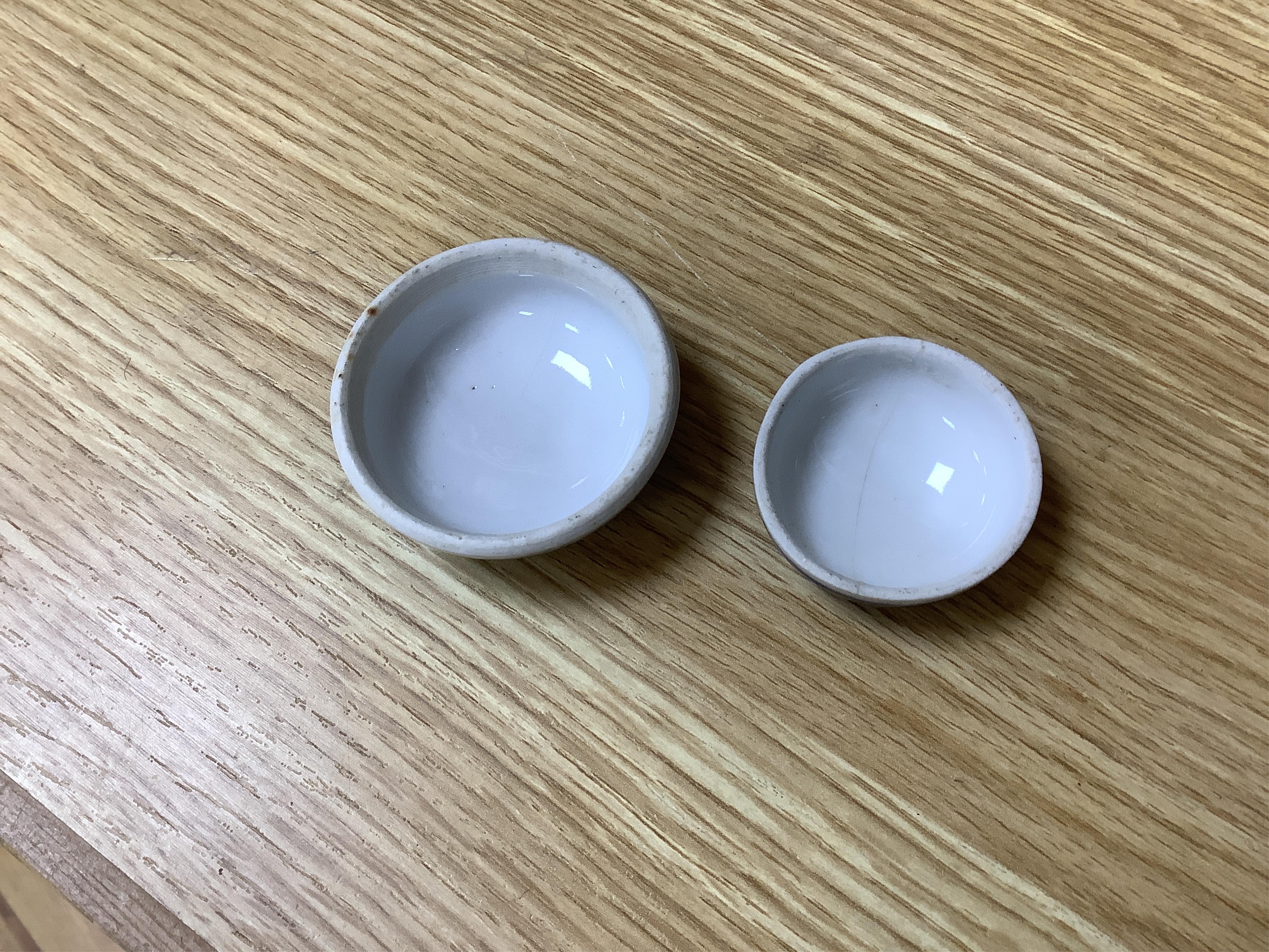 Three late 19th century Chinese blue and white prunus jars, tallest 15cm. Condition - one cover broken in two and re-glued, otherwise good